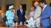 The Queen and the Duke of Edinburgh talk to Antiques Roadshow experts at Hillsborough Castle.