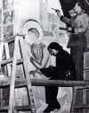 Evelyn Gibbs painting the murals at St. Martin's Church.