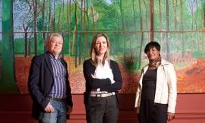 &#039;The work he does on his iPad has the painterly quality of oils – it&#039;s astonishing.&#039; Hockney expert Marco Livingstone, curator Edith Devaney (centre) and PR Jennifer Francis at the Royal Academy. 