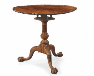  A Chippendale carved Mahogany scallop-top tea table probably the shop of Benjamin Randolph with carving possibly by Richard Butts, Philadephia, circa 1770.