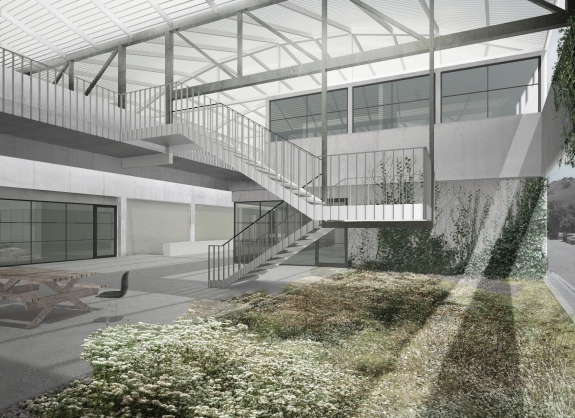 View of garden and patio adjacent to arcade and studio building with stairs to upper level classrooms. 