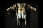 Oglala Sioux Beaded and Fringed Hide War Shirt. Est. $250/250,000. Sold for: $2,658,500.