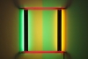 The exhibition includes works by Dan Flavin.