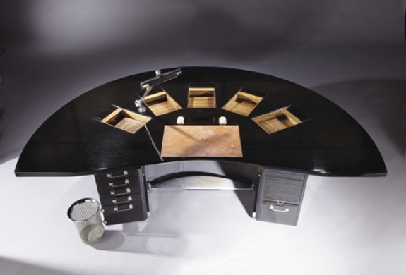 A black lacquer &quot;Tardieu&quot; desk created by the Art Deco designer Emile-Jacques Ruhlmann sold for 2.3 million euros at Christie&#039;s International&#039;s three-day Paris auction of the Gourdon Collection of 20th-century design. The desk was estimated to sell for between 2 million euros and 3 million euros.