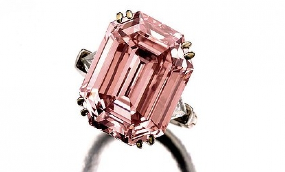 A &quot;fancy intense pink&quot; diamond sold for 9.6 million francs ($10.9 million) including fees in Sotheby&#039;s auction of jewels in Geneva on May 17. The emerald-cut stone weighs 10.99 carats and had not been on the market for 30 years.
