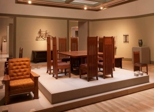 Frank Lloyd Wright (1867–1959), (left to right) Arthur Heurtley House Reclining Armchair, ca. 1902; Husser House Dining Suite, 1899; Avery Coonley House Oak Spindle Side Chair, ca. 1908.