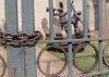 In this image taken Tuesday, Oct. 11, 2011, a metal sculpture titled: “Tightroping” by sculptor David Brown is seen locked behind bars at the Johannesburg Art Gallery. One of the bronze sculptures stolen from the Johannesburg Art Gallery is worth about $16,000. Curators now fear that the thieves instead sold it to a scrap dealer for a mere $250. Copper _ the main component in bronze _ has been selling for nearly double its price just two years ago. And as the stolen bronzes fail to turn up at auction houses, galleries can only fear the worst.