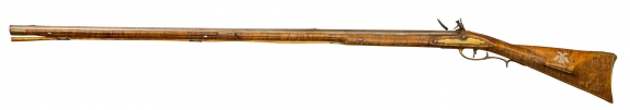 A rifle by J.P. Beck.