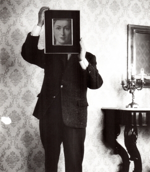 A photograph of Rene Magritte by Shunk-Kender.