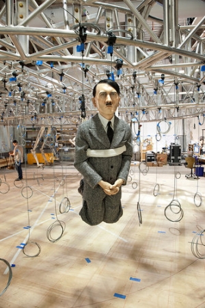 “Him” (2001), by Maurizio Cattelan, whose retrospective will be made up of pieces dangling overhead in the Guggenheim.