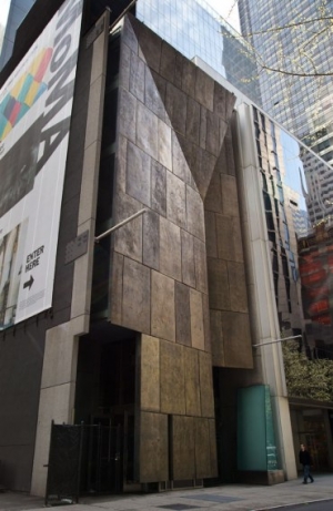 The American Folk Art Museum&#039;s former home stands next to the Museum of Modern Art.