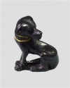 A Figurine of a dog made of bronze with a gold collar attributed to Tutankhamun"s tomb, which was discovered by Howard Carter in 1922 in the Valley of the Kings is seen in this handout picture released on November 9, 2010.