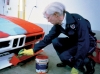 Andy Warhol paints directly onto a BMW M1 in 1979.