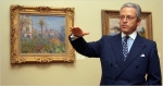 Guy Wildenstein, with Monet&#039;s &quot;Villas at Bordighera&quot; (1884), at the Wildenstein &amp; Company gallery in New York in 2007. Mr. Wildenstein has been called for questioning by French fraud investigators.
