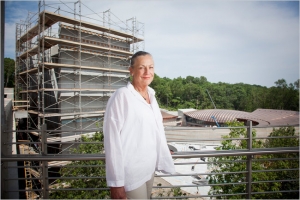Alice Walton in front the construction site of Crystal Bridges Museum of American Art in Bentonville, Ark. The 201,000-square-foot museum was designed by the Boston architect Moshe Safdie.