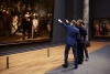 Wim Pijbes and President Obama in front of Rembrandt's 'The Night Watch.'