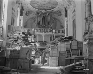 GI guarding looted art stored at Schlosskirche Ellingen, Bavaria, April 1945.