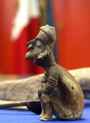 A clay statue is among some of the seized artifacts returned to Mexico.