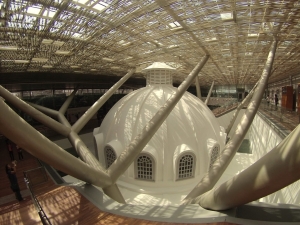 Rotunda dome of National Gallery Singapore beneath the paneled roof 