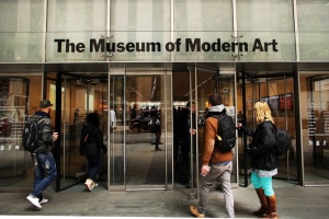 Visitors entering the Museum of Modern Art (MoMA) in New York City. The museum’s director, Glenn Lowry, led New York’s cultural-institution leaders in 2013 total compensation, earning $3.4 million. 