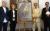 Tomeu Lamo, Carmen Sandalinas Linares, Nicolas Descharnes and Jose Pedro Venzal Placido pose next to a copy of an unreleased work by Salvador Dali titled 'The Intrautirine Birth of Salvador Dali.' 