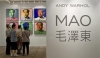 Visitors look at a ten-piece set paper screenprint of Mao Zedong by Andy Warhol, which is part of Warhol&#039;s series of the late Chinese leader, displayed at the Hong Kong Convention and Exhibition Centre during Christie&#039;s 2008 Spring Sales May 26, 2008.