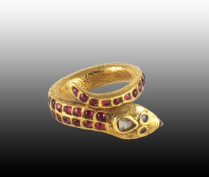 A ruby and gold snake ring, South India, 19th century.
